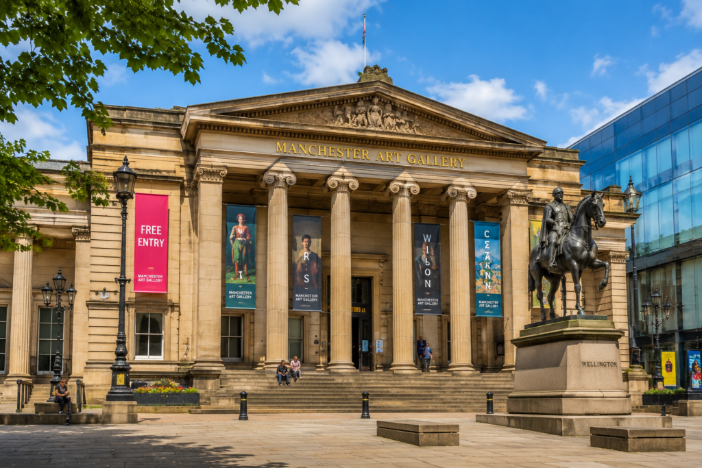 Manchester Art Gallery in Manchester UK with neoclassical architecture, grand columns, historic building, and visitors